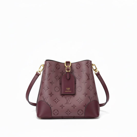 Louis Vuitton vintage fringe bucket bag
